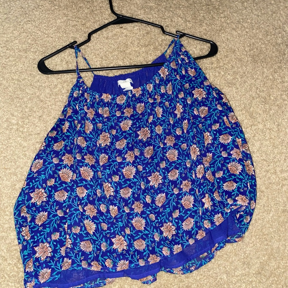 This is a blue tank top from H & M made in Indonesia